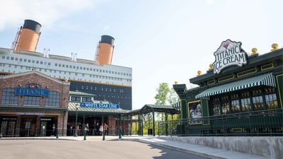 An Exterior image of the Titanic Museum Attraction and the Titanic Ice Cream buildings beside each other. 