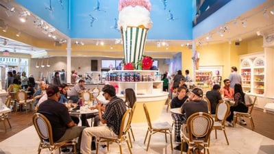 Guests enjoying ice cream in the themed shop at the Titanic Museum in Pigeon Forge.