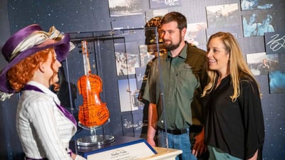The multimillion dollar movie exhibit at the Titanic Museum in Pigeon Forge: A costumed character engaging with visitors.