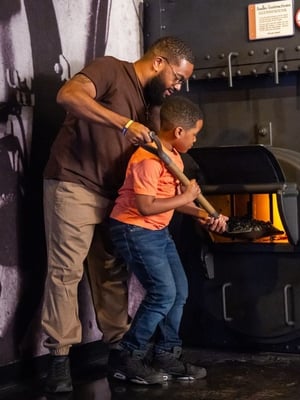 A father and son at the Boiler at the Titanic Museum Attraction