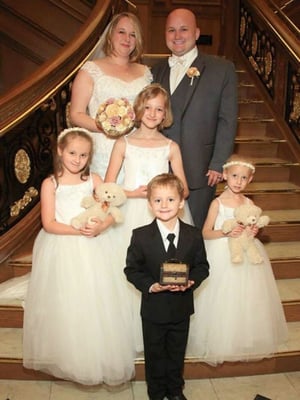 A Titanic wedding with family at the Grand Staircase.