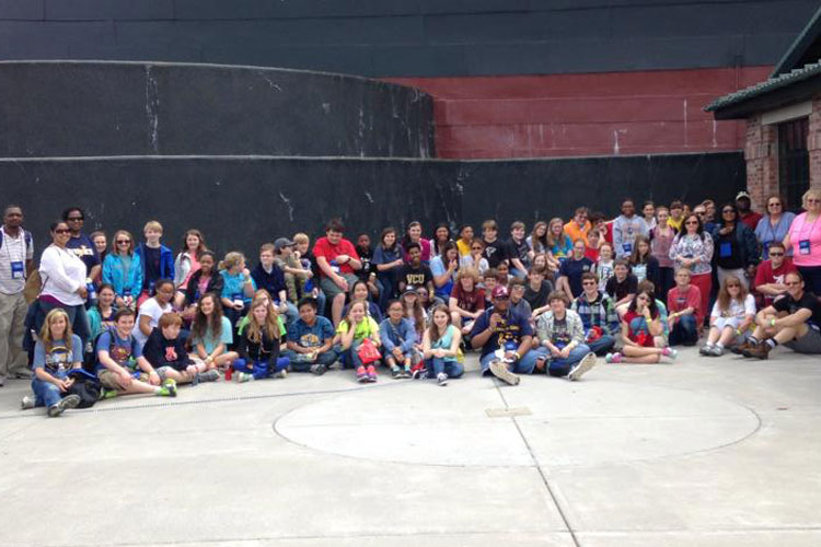 large group of students outside Titanic attraction