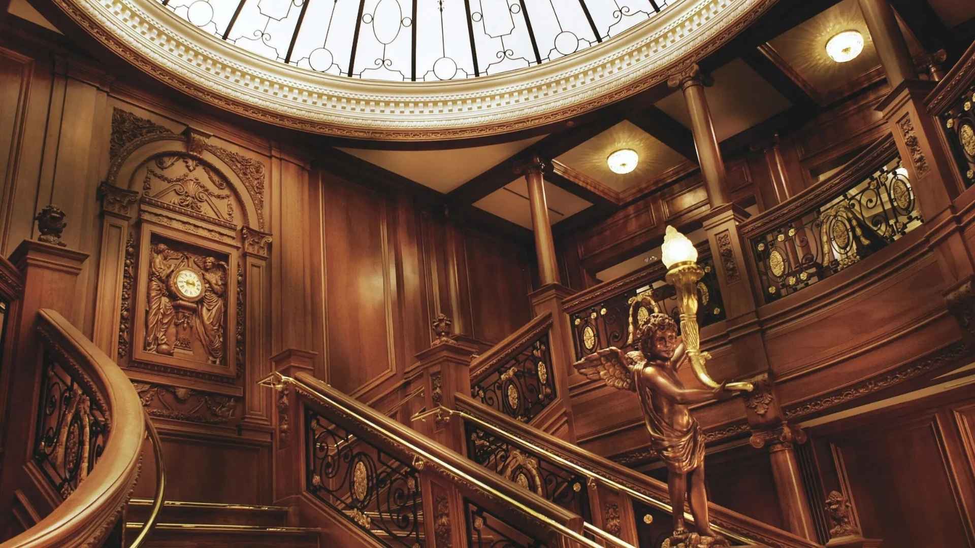 A sweeping view of the Grand Staircase at the Titanic Museum, built to original blueprints.